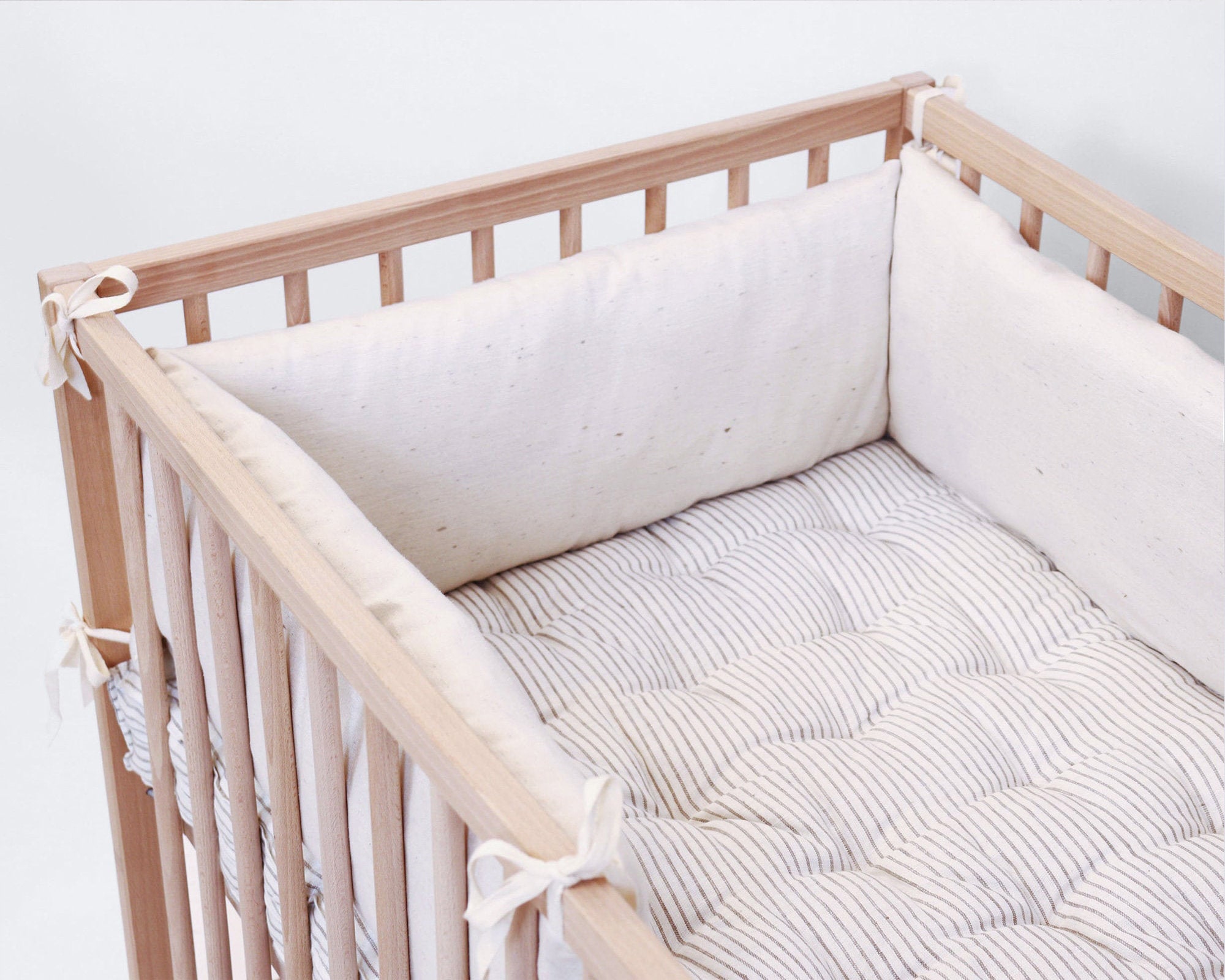 mini crib with adjustable mattress height